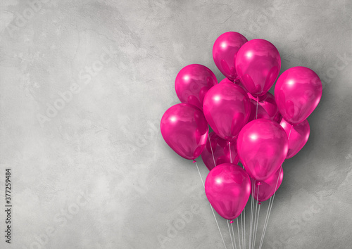 Pink air balloons group on a light concrete wall banner