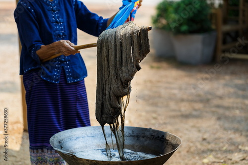 Cotton line dyeing with natural colors,Yarn, raw materials for cotton,Dyeing silk, Using traditional natural materials, Raw multicolored cotton thread,select focus.