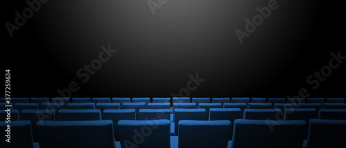 Cinema movie theatre with blue seats rows and a black background. Horizontal banner