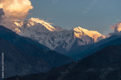 Evening sunset light over Nanga Parbat mountain massif. Himalaya mountains range in Pakistan