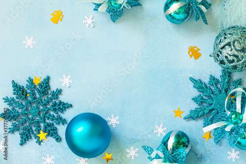 Christmas background. Composition Christmas decor on a blue background. Top view of a flat lay background.