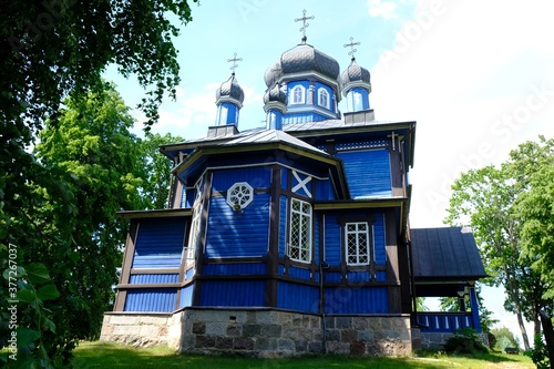 Beautiful historic wooden Orthodox church in the village of Puchly in Podlasie, Poland. This area is called the Land of Open Shutters