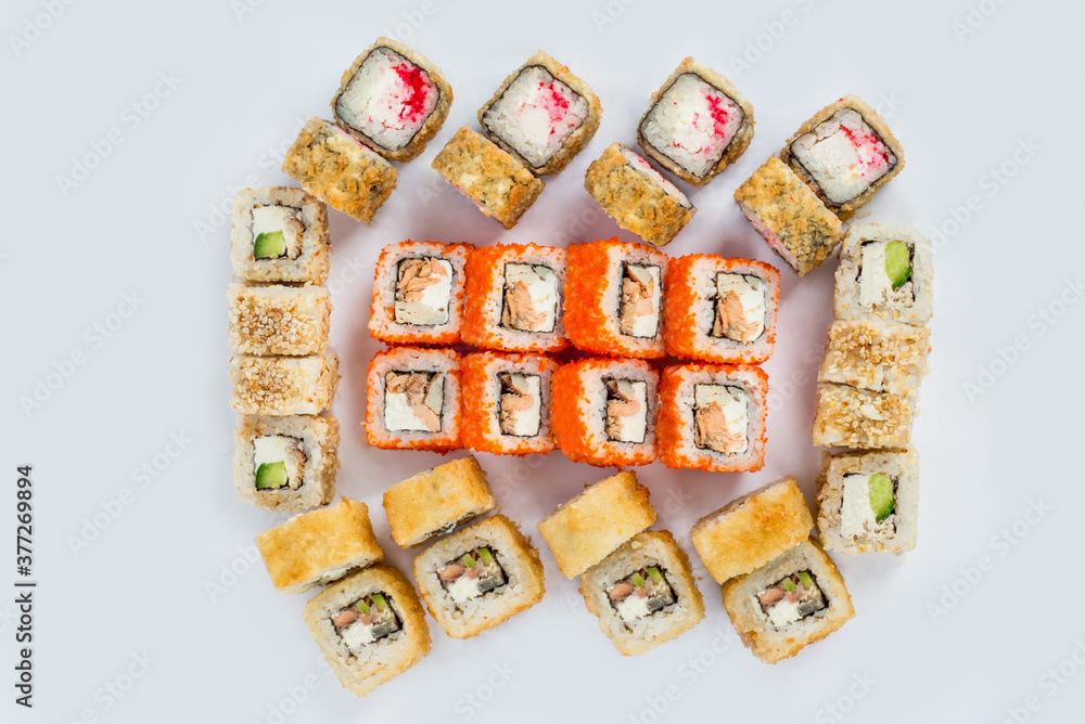 Sushi and roll sets shot on a white background