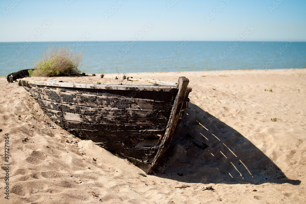 old abandoned boat on the beach