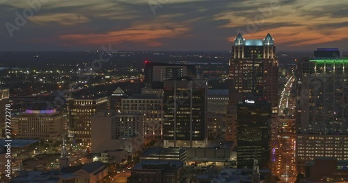 Orlando Florida Aerial v34 pan right shot of downtown cityscape at dusk night and cirrostratus clouds - DJI Inspire 2, X7, 6k - March 2020 photo