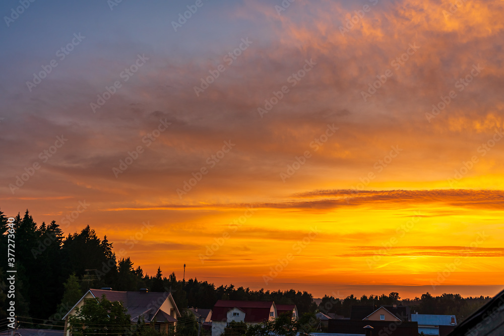 Obraz premium Orange-red sunset against the blue sky near Moscow, Russia