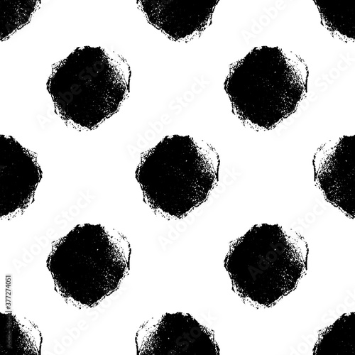 Mono print style grunge circles seamless vector pattern background. Black and white textured stamp effect round shapes on white backdrop. Hand crafted stamp design. All over print