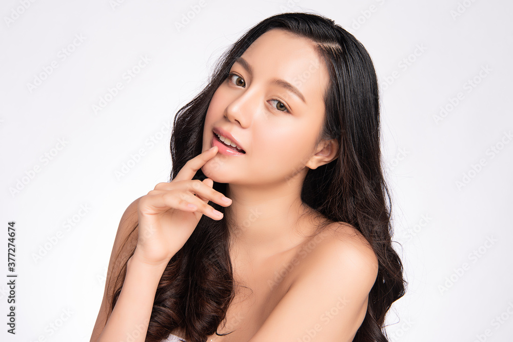 Beautiful young asian woman with clean fresh skin on white background, Face care, Facial treatment, Cosmetology, beauty and spa, Asian women portrait Beautiful young asian woman with clean fresh skin on white background, Face care, Facial treatment, Cosmetology, beauty and spa, Asian women portrait