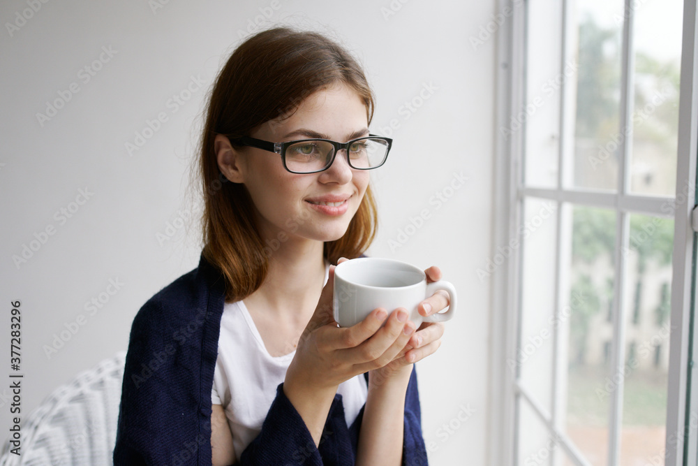 Cheerful woman cup of coffee morning home interior Cheerful woman cup of coffee morning home interior