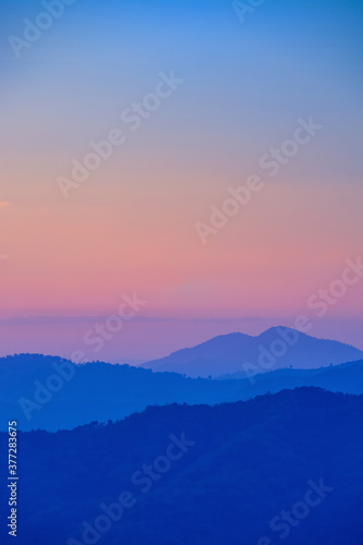 sunset sky on mountain hill, photo with partly blur and also had noise & gain