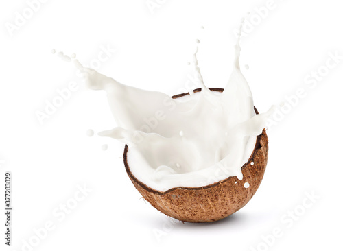 Coconut milk with splash isolated on a white background