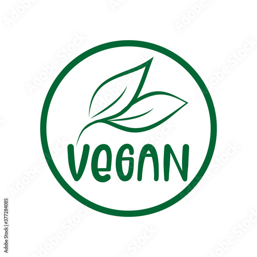 Vegan logo green leaf label  for veggie or vegetarian food package design. Isolated green leaf icon for vegetarian bio nutrition and healthy diet or vegan restaurant menu symbol.