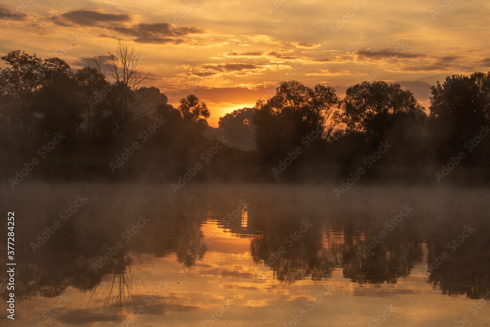 Obraz premium sunrise over the lake, Gułdowy, Cieszyn