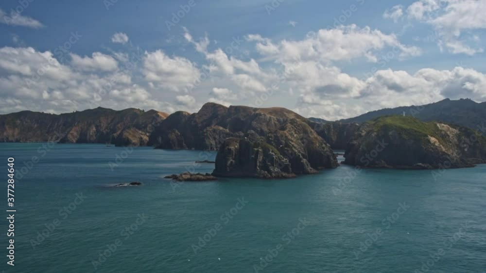 Rock formations a the nothern end of South Island entering the Cook strait. View from the ferry driving through the malborough sound of New Zealand, South Island Rock formations a the nothern end of South Island entering the Cook strait. View from the ferry driving through the malborough sound of New Zealand, South Island