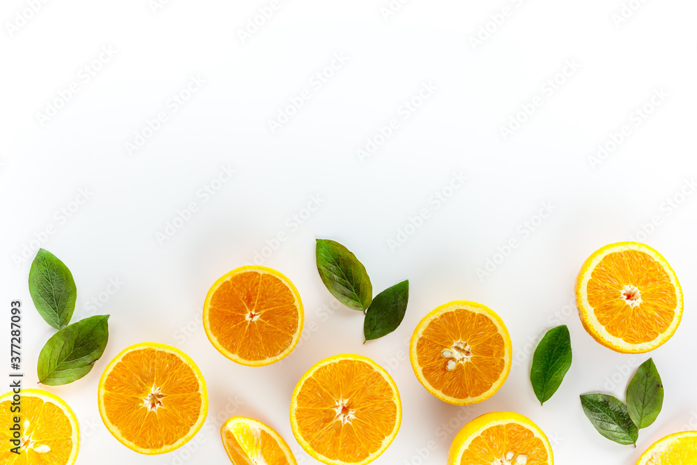 Orange slices on white background top view copy space Orange slices on white background top view copy space