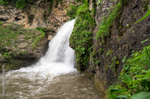 View of waterfall in Caucasus mountains