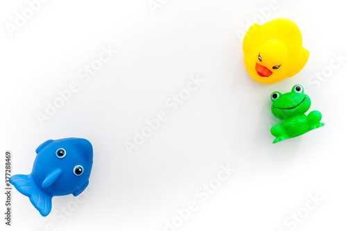 The concept of children   s bath toys. White background top view copyspace