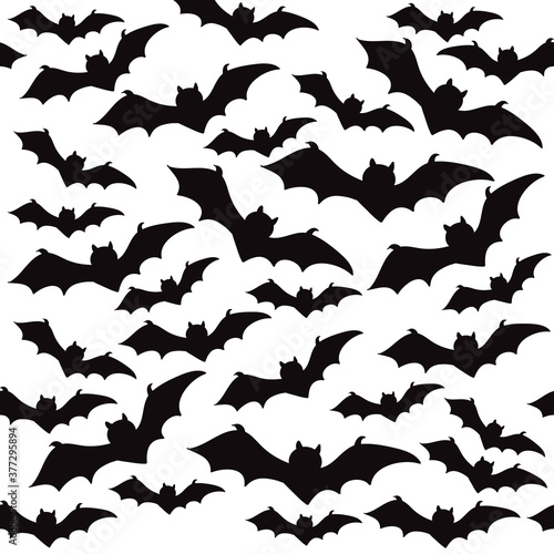 Vector silhouette of bats for the holiday halloween seamless pattern