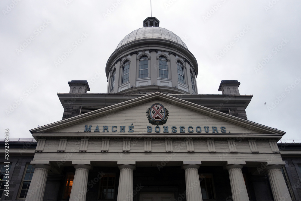 a vertical view of the historical building of Bonsecours Market in Old Montreal 