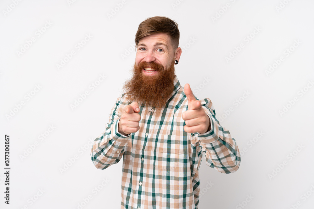 Redhead man with long beard over isolated white background pointing to the front and smiling Redhead man with long beard over isolated white background pointing to the front and smiling