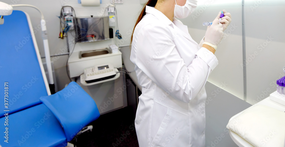 Young woman with a blood test in the laboratory. Young woman with a blood test in the laboratory.