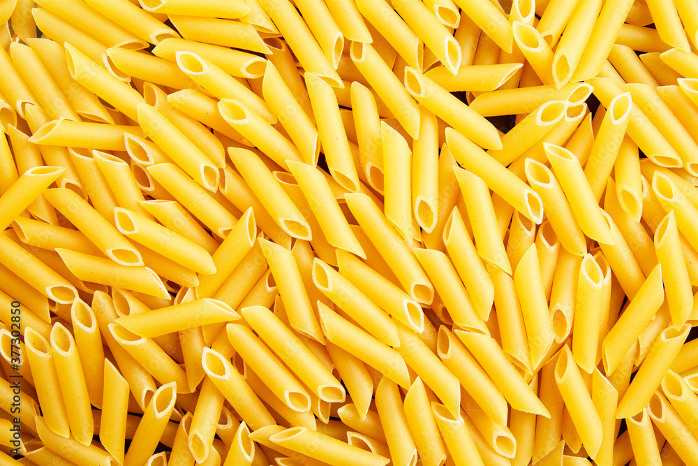 Macaroni background, Italian pasta. Background for publicity Macaroni background, Italian pasta. Background for publicity