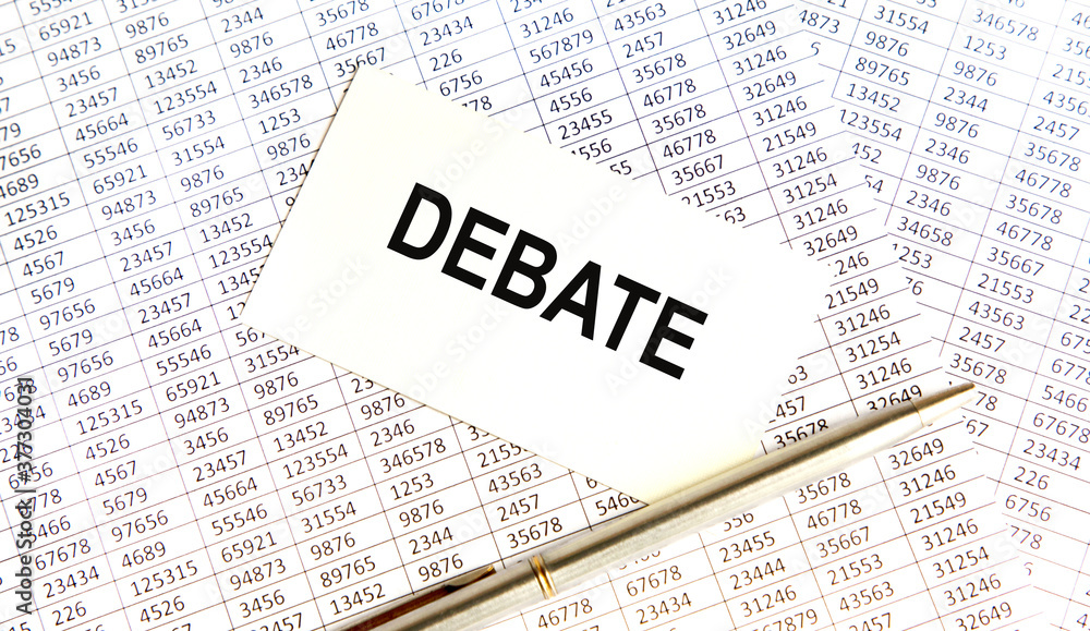 Obraz premium DEBATE is the inscription on the business card. Nearby pen, reports, books.