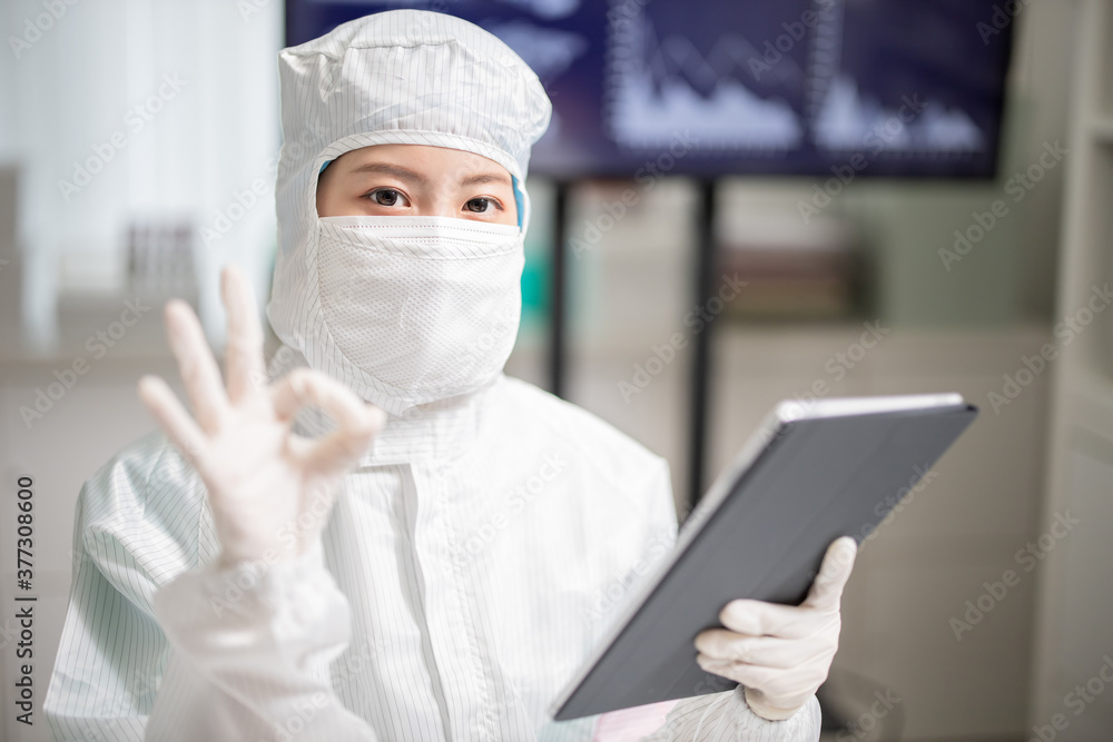 asian scientist with ok gesture asian scientist with ok gesture