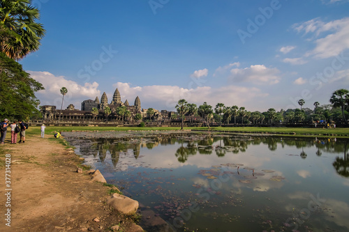 Tourists taking a tour and photographing pictures of Angkor Wat, the world heritage site in Siem Reap, Cambodia.  © NUTTEE