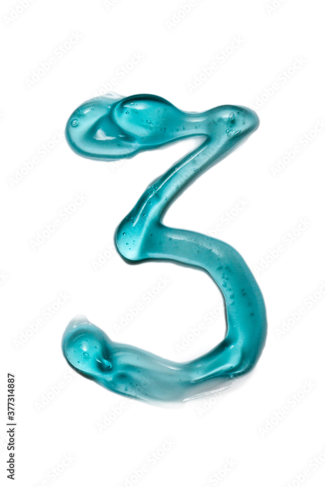 Naklejka premium Number three written by transparent gel isolated on white background. Squeezed transparent gel with bubbles close-up