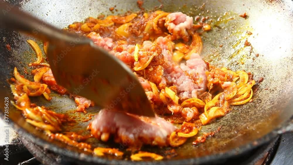 Frying minced pork with chili paste in pan, Thai famous food Frying minced pork with chili paste in pan, Thai famous food