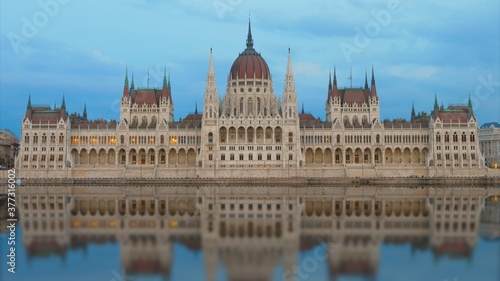 Canvas Print Budapest Parliament mirrored in Danube River at evening