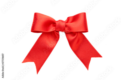 Shiny red satin bow isolated on white background.