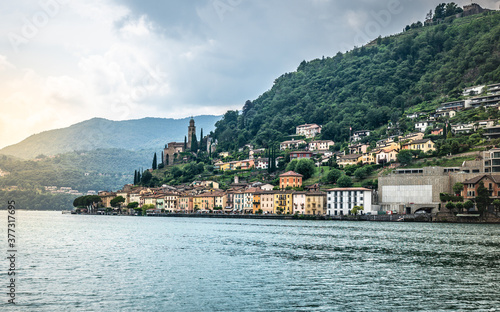 Morcote lakeside village scenic townscape view taken from Lake Lugano and dramatic light in Ticino Switzerland