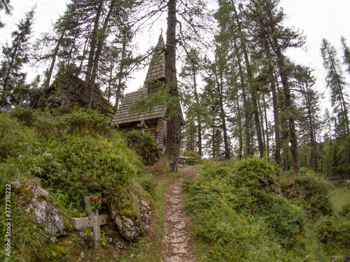 I world war old wood church and cemetery in dolomites valparola