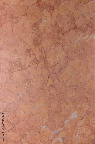 Natural polished stone texture. Abstract background. Natural marble, marble texture. Beautiful orange marble background or texture (ceramic tiles)