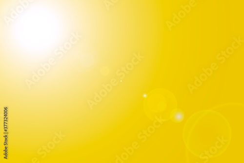 yellow background with sun glare