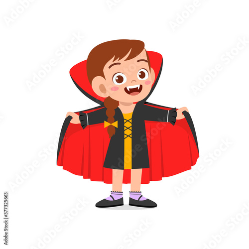 happy cute little kid boy and girl celebrate halloween wears dracula vampire costume with cape
