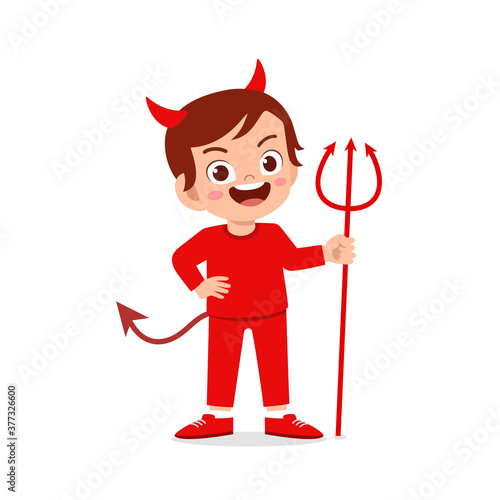 happy cute little kid boy and girl celebrate halloween wears red devil monster costume