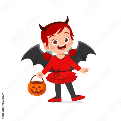 happy cute little kid boy and girl celebrate halloween wears red devil monster costume