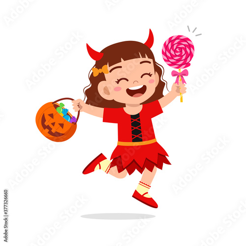 happy cute little kid boy and girl celebrate halloween wears red devil monster costume