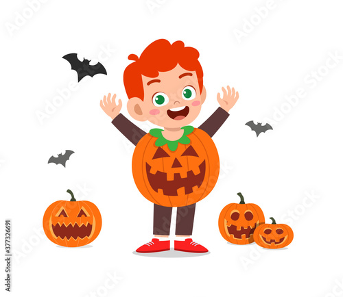 happy cute little kid boy and girl celebrate halloween wears pumpkin monster costume