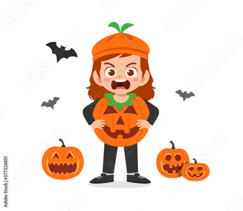 happy cute little kid boy and girl celebrate halloween wears pumpkin monster costume
