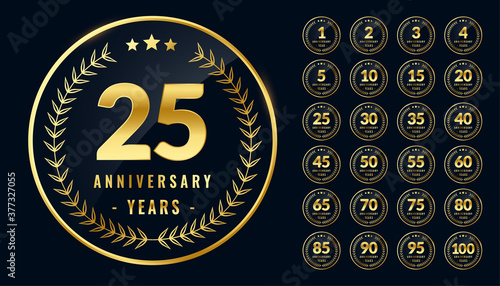 set of rounded anniversary golden labels or emblems