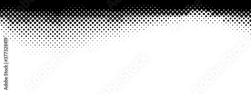 Abstract halftone monochrome dotted pattern.
