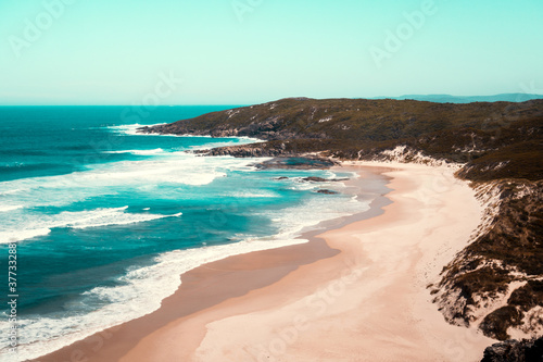 Deserted beach  pure white sand  blue and turquoise water  Western Australia