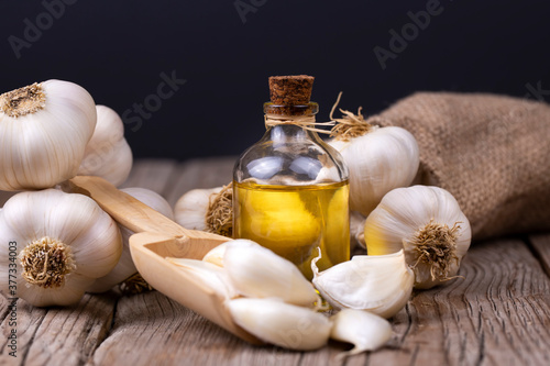 Glass bottle of garlic oil ...