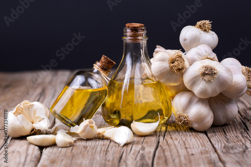 Glass bottle of garlic oil ...