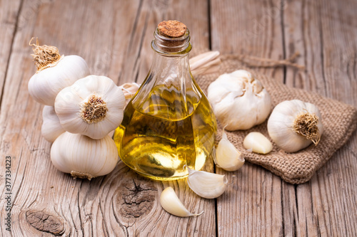Glass bottle of garlic oil ...
