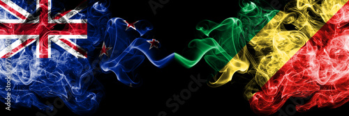 New Zealand vs Congo, Congolese smoky mystic flags placed side by side. Thick colored silky abstract smoke flags